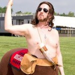 The message of Kegasus, Lord of the Infieldfest: “A 10-hour party to celebrate a two-minute race.”