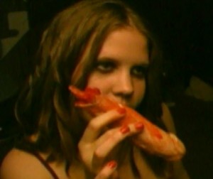 A vampire hooker enjoys a horndog with lotsa ketchup in "Blood Seduction."