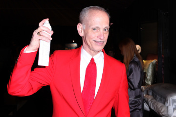 John Waters doesn't split hairs when it comes to loving Christmas.
